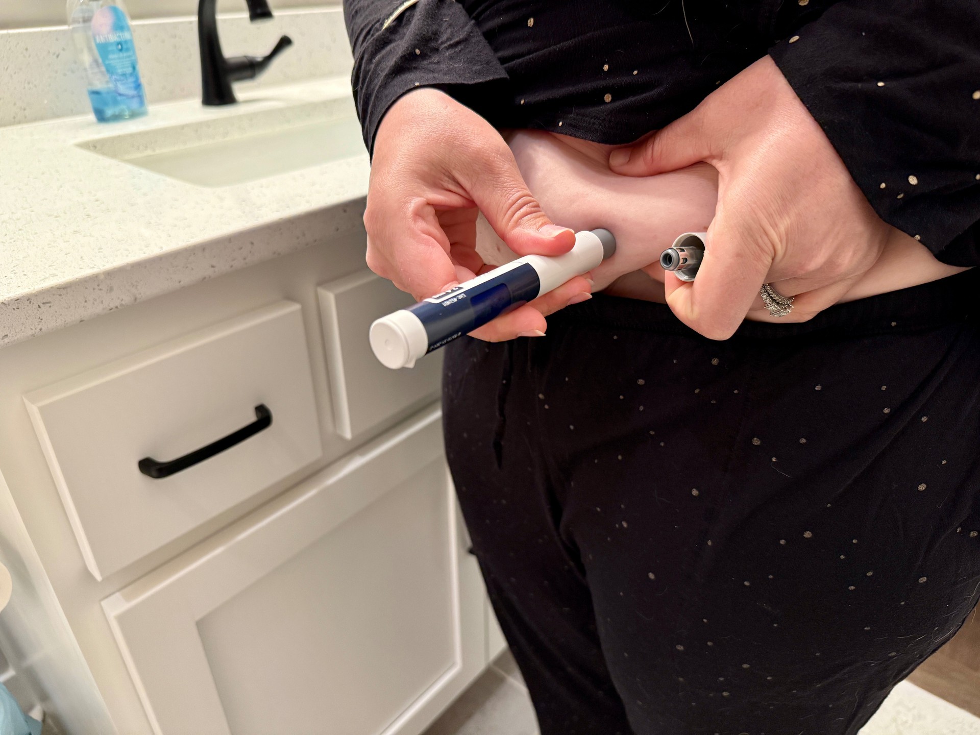 Woman Gives GLP-1 Shot to Herself at Home